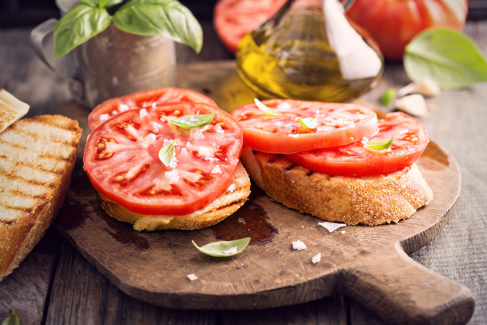 Fancy toast can taste fresh when you add tomatoes and basil.
