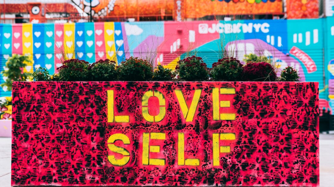 Love self on a city planter.