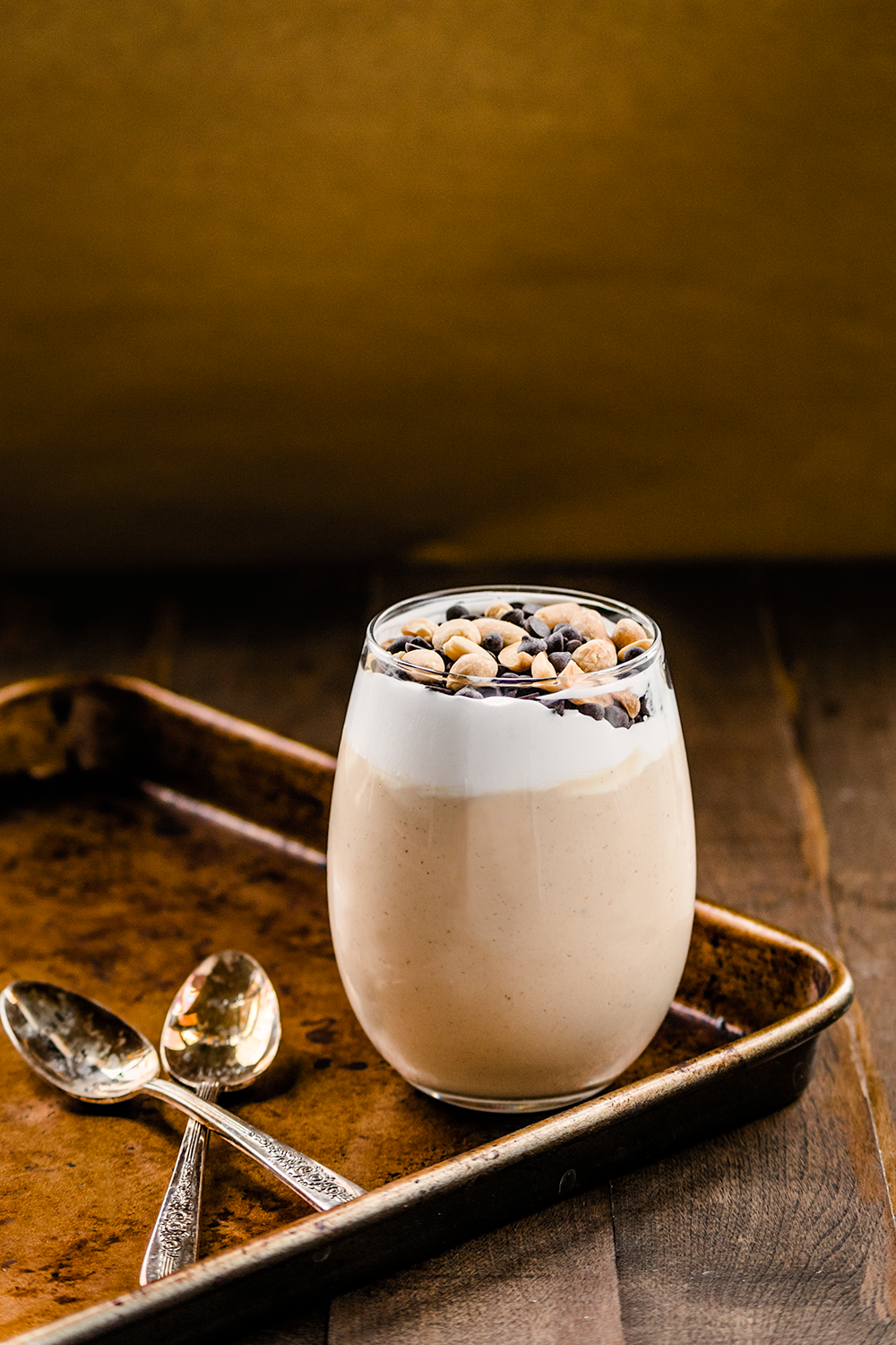 Vegan Peanut Butter Mousse with Coconut Whipped Cream, Chocolate Chips, and Peanuts