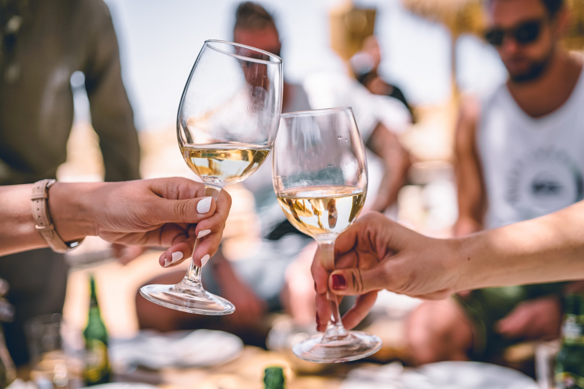 friends toasting with organic wine