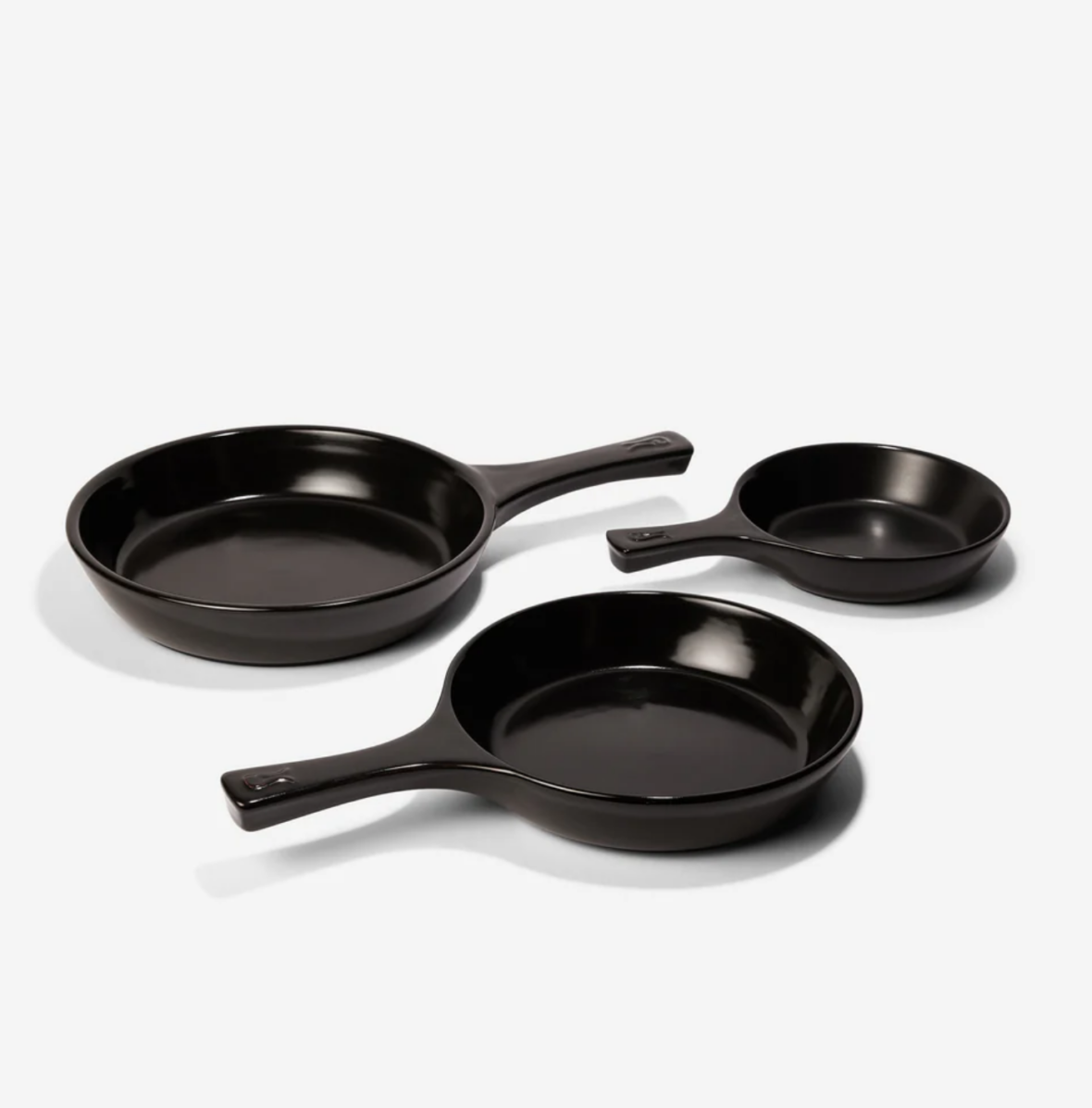 Image of the timeless design of Xtrema's Signature Skillet Set, made with their proprietary blend which are microwave safe and oven safe and free of PFAs and other toxins  on white background.