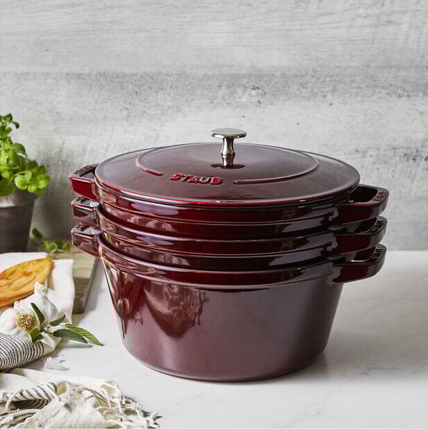 Image of the Staub 4-piece stackable cast iron set in grenadine.