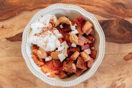 image of a sweet potato breakfast bowl served in a pretty bowl. This yummy bowl is super easy to put together.