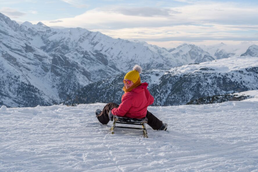 sledding outdoor winter workout ales krivec unsplash