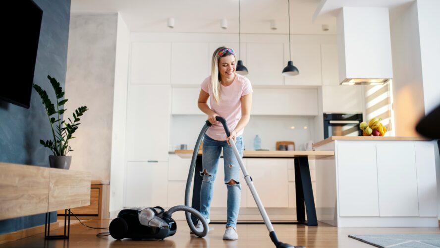 image of woman cleaning a floor with natural cleaners