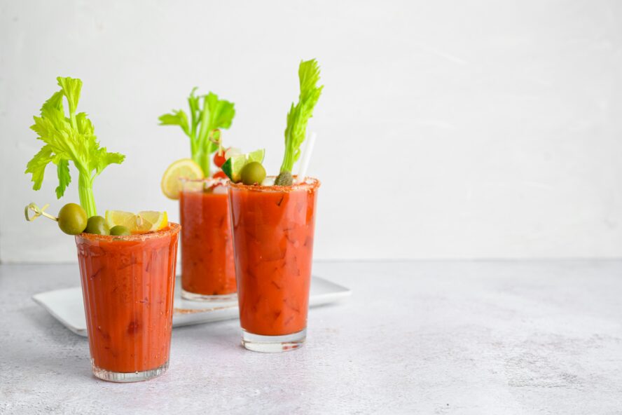 bloody mary mix recipe in three glasses with veg garnish joanna stolowicz unsplash