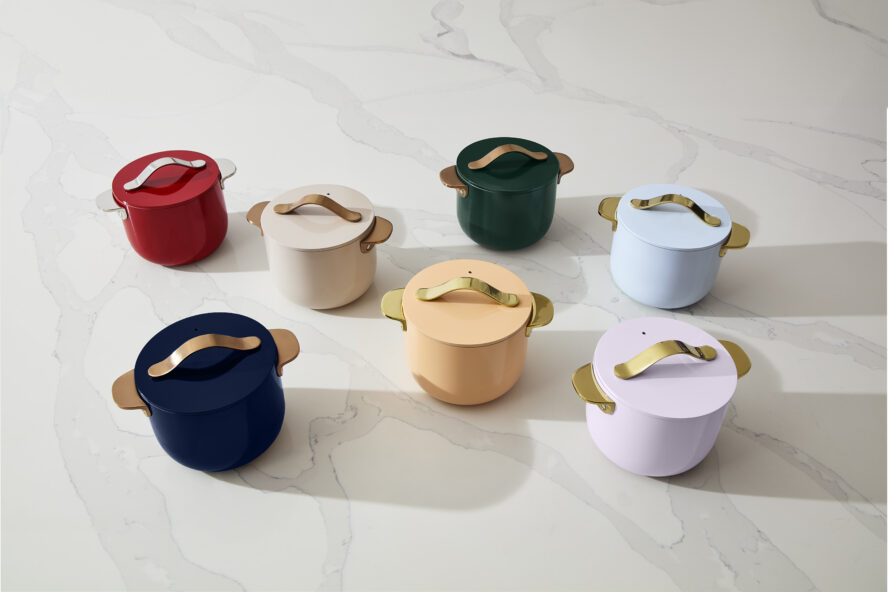 Image of Caraway's new petite cookers in 7 different colors, all with a ceramic coating and aluminum core.