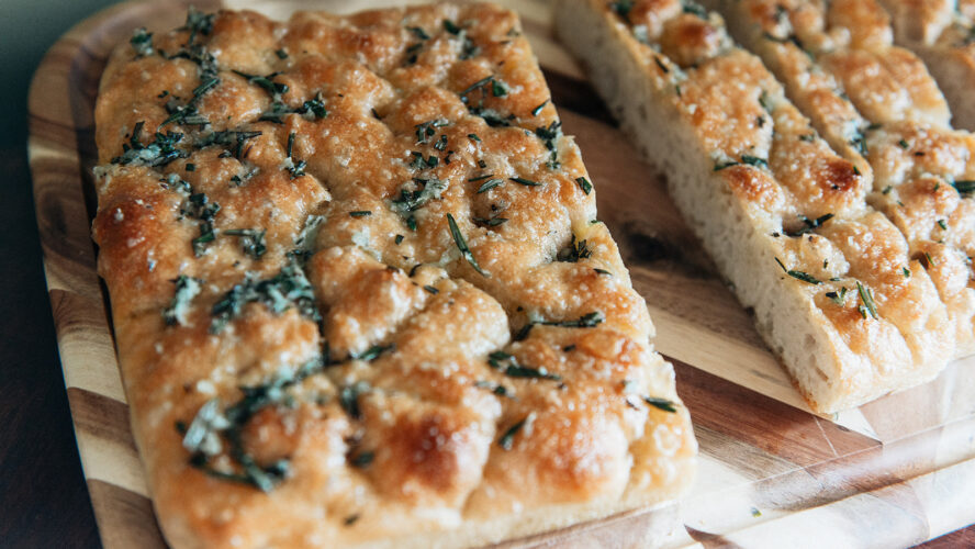 This focaccia recipe is easy, fast, and delicious, thanks to an extra dusting of herby garlic butter sauce.
