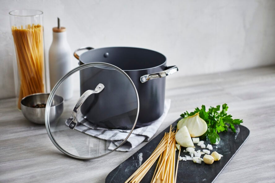 Image of a GreenPan Valencia Pro stock pot with pasta prep in a plate around it.