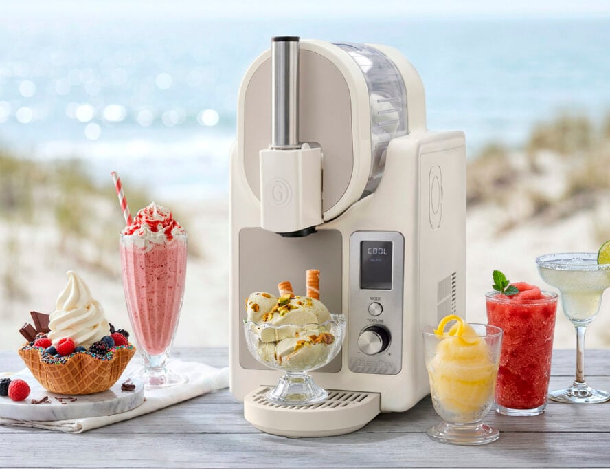 Image of the GreenPan Frost Pro in Cream shown against an ocean backdrop surrounded by frozen treats.
