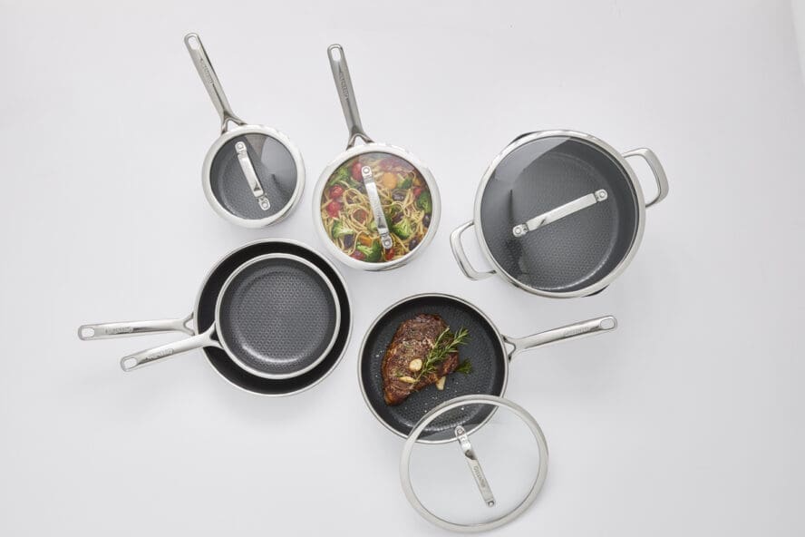 Overhead image of pieces in the GreenPan Spectra line, including frypans, a stockpot, sauté pan, and more.