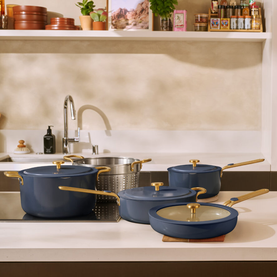 Soft curves, beautiful colors, and those eye-catching gold-toned handles. The Essentials cookware makes even storage look chic. 