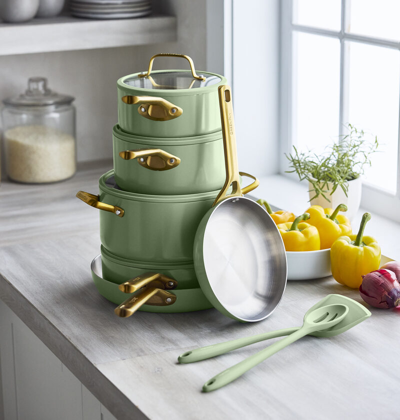 Image of the GreenPan Reserve Pro Stainless Steel set in sage stacked in a kitchen.
