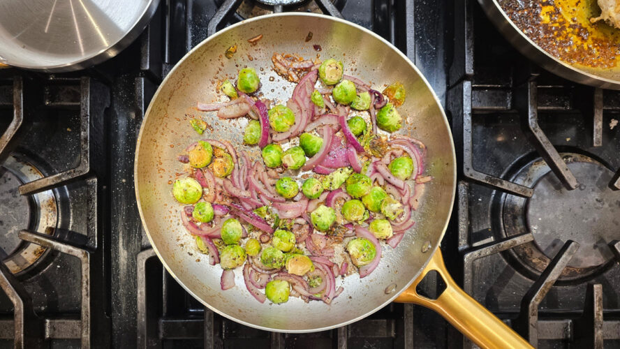 GreenPan Reserve Stainless Steel frying up veg