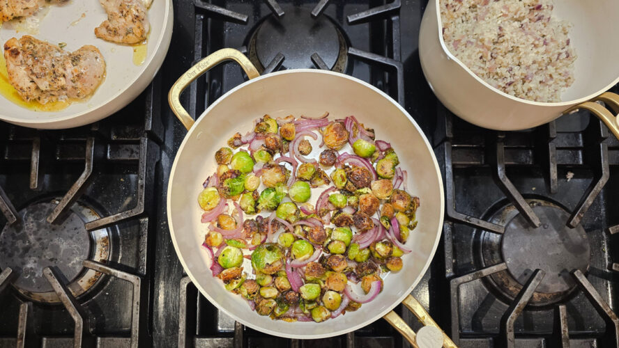 our place essentials frypan with sauteed brussels' sprouts
