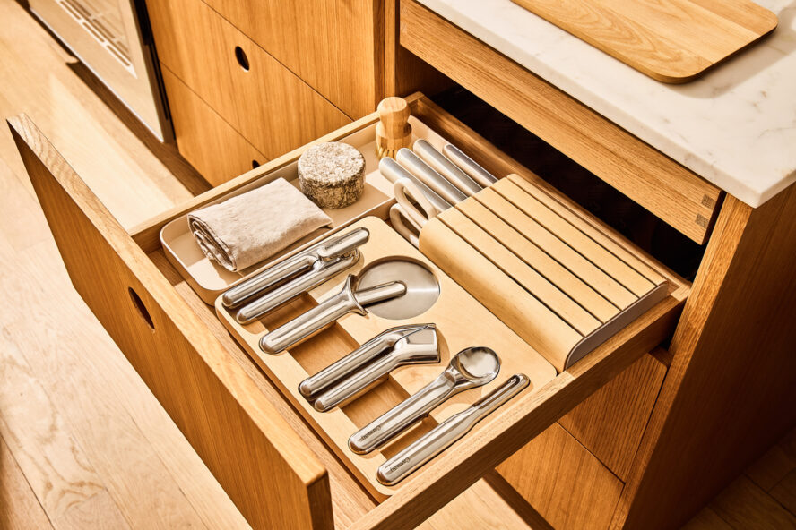 Image of the Caraway Gadget Essentials Set, displayed beautifully in the drawer organizer included in the set.