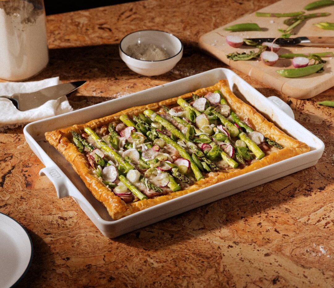 Image of the Made In baking slab being used to bake a puff pastry tartine with asparagus and radish.