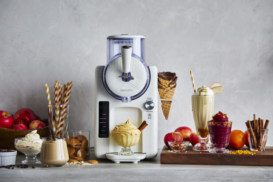 Image of the GreenPan Frost frozen treat-maker in Cream, surrounded by a number of frozen treats like pumpkin soft serve.