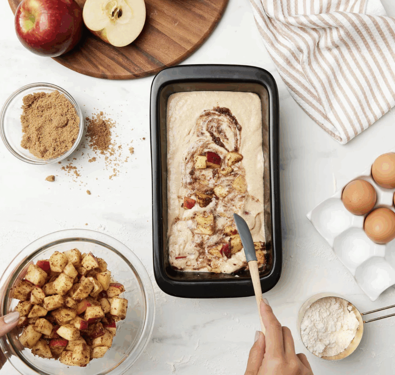 Image of the Xtrema Loaf Pan filled with dough for an apple cinnamon loaf.