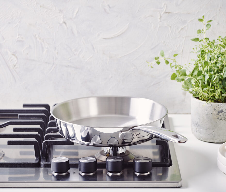 Image of the Alva Maestro 5-ply stainless steel frying pan sitting pretty on a stovetop.