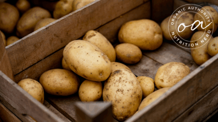 Image of a wooden crate with a pile of potatoes, featuring the Organic Authority Nutrition Nerd stamp.