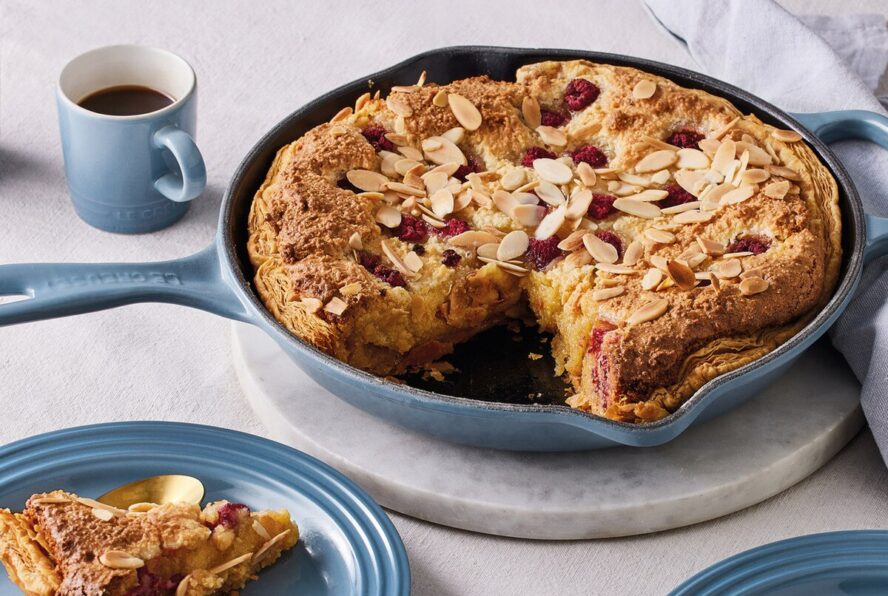 Image of the Le Creuset Signature Skillet in Azure Blue, shown with a beautiful almond frangipane tart.