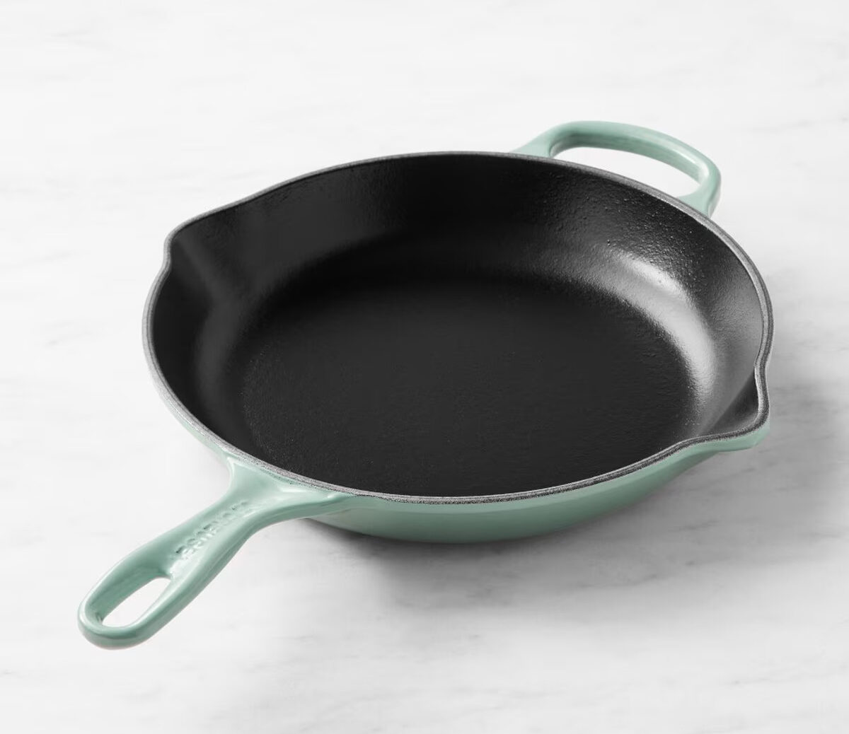 Image of a Le Creuset Signature Skillet with its enameled cast iron finish.