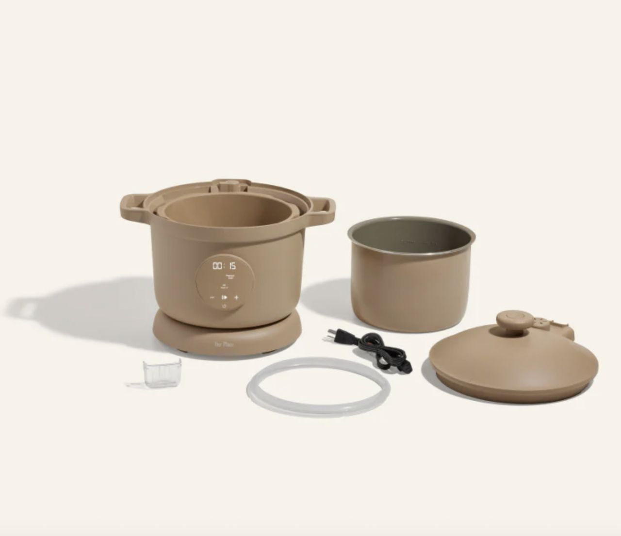 Image of the Our Place Dream Cooker in the color Steam, showcasing the individual pieces that come with a purchase.