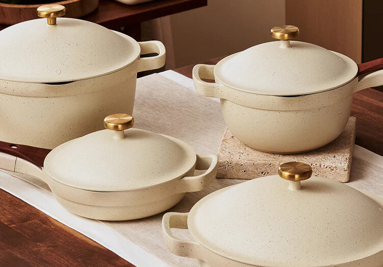 Image of four Our Place pieces with lids in Vanilla Bean — the Always Pan, Perfect Pot, and mini versions of both.