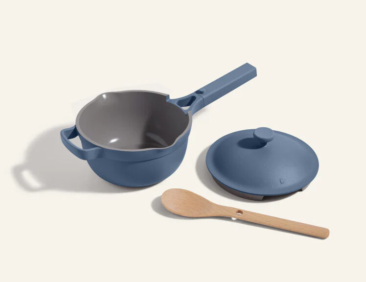 Image of the Perfect Pot in Blue shown with the lid and spoon separately.