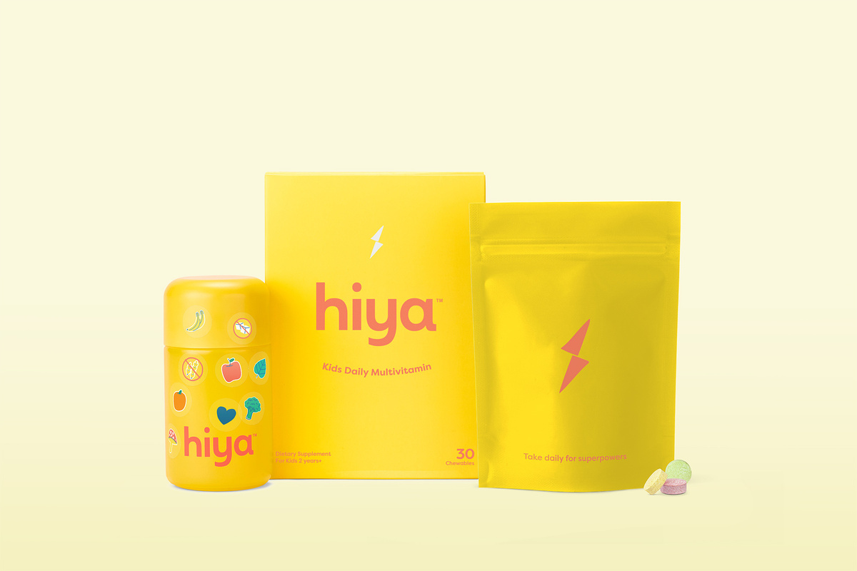 Image of the Hiya Kids Daily Multivitamin chewable product with the refillable glass bottle and refills pouch shown.