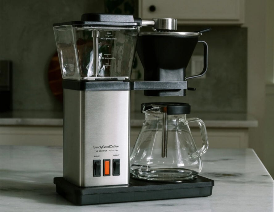 Image of the SimplyGoodCoffee The Brewer coffee maker set on a marble countertop.